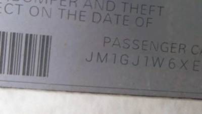 VIN JM1GJ1W6XE1138868